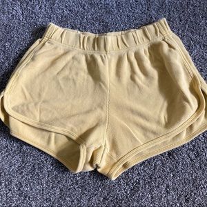 BRANDY MELVILLE YELLOW WAFFLE KNIT SWEATSHORTS